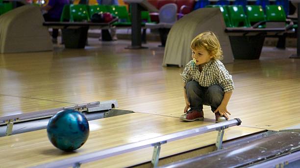 Little boy bowling